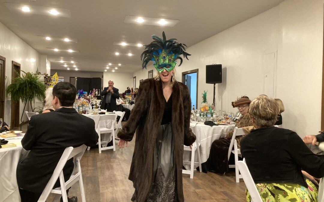 A woman covered her face with a mask at the harvest gala