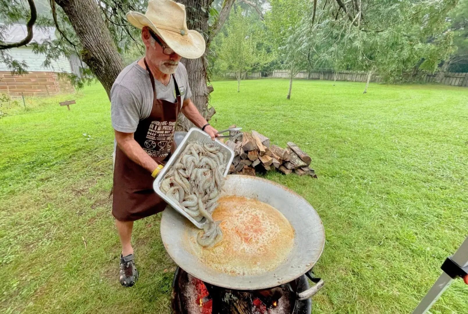 Man cooking shrimp